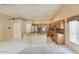 Well-appointed kitchen showcasing stainless steel appliances, granite countertops, and wood cabinetry at 604 W Villa Rita Dr, Phoenix, AZ 85023