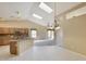 Bright eat-in kitchen boasts stainless appliances, granite countertops, ample cabinet space, and a seamless flow to living spaces at 604 W Villa Rita Dr, Phoenix, AZ 85023