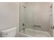 Bathroom with glass door and shower at 6820 W Angela Dr, Glendale, AZ 85308