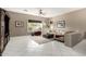 Spacious living room with tiled flooring, ample natural light and neutral decor at 6820 W Angela Dr, Glendale, AZ 85308