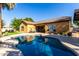 Inviting backyard pool featuring a spacious patio, perfect for outdoor relaxation and entertainment at 6820 W Angela Dr, Glendale, AZ 85308
