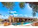 A backyard featuring a pool and a covered patio offering a perfect blend of relaxation and outdoor enjoyment at 7656 W Wagoner Rd, Glendale, AZ 85308