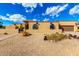 Beautiful single-story home showcasing a well-kept yard, brown trim, and attached garage at 7656 W Wagoner Rd, Glendale, AZ 85308
