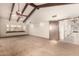Expansive living room with vaulted ceilings and a cozy window nook at 7656 W Wagoner Rd, Glendale, AZ 85308