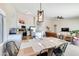 Open concept dining area shows kitchen and living room, great for entertaining guests in an open layout at 832 N Blue Marlin Dr, Gilbert, AZ 85234