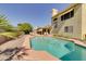 Backyard view of a private pool and patio, perfect for relaxing or entertaining guests outdoors at 832 N Blue Marlin Dr, Gilbert, AZ 85234