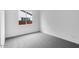 Bright bedroom with gray carpeting and natural light from a window at 8324 W Palo Verde Dr, Glendale, AZ 85305