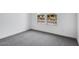 Bright bedroom with gray carpeting and natural light from two windows at 8324 W Palo Verde Dr, Glendale, AZ 85305