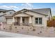 Charming single-story home with stone accents and a well-manicured front yard at 8324 W Palo Verde Dr, Glendale, AZ 85305