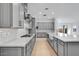 Beautiful kitchen featuring white countertops, stainless steel appliances, and a large island at 8324 W Palo Verde Dr, Glendale, AZ 85305