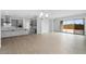 Spacious living room with light-toned floors and large sliding glass doors leading to the outside at 8324 W Palo Verde Dr, Glendale, AZ 85305