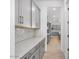 Butler pantry with plenty of cabinets and counter space at 8324 W Palo Verde Dr, Glendale, AZ 85305