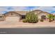 Charming single-story home featuring a two-car garage and beautiful desert landscaping with a towering cactus at 8336 E Neville Ave, Mesa, AZ 85209