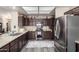 Well-equipped kitchen with stainless steel appliances, a gas range, and plenty of counter space for food preparation at 8336 E Neville Ave, Mesa, AZ 85209