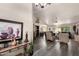 Spacious living room with vaulted ceilings, a ceiling fan, and an open floor plan at 8336 E Neville Ave, Mesa, AZ 85209