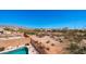 Spacious backyard with mountain views showcases the neighborhood's desert landscape with secure fencing at 8377 S Mountain Air Ln, Gold Canyon, AZ 85118