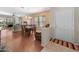 Open-concept living room and dining area with hardwood floors and ample natural light at 8377 S Mountain Air Ln, Gold Canyon, AZ 85118