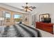 Spacious primary bedroom with a fan, a desk, and a dresser at 8377 S Mountain Air Ln, Gold Canyon, AZ 85118