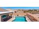 Private backyard pool with desert landscaping and mountain views, perfect for relaxing and entertaining at 8377 S Mountain Air Ln, Gold Canyon, AZ 85118