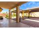 Cozy backyard featuring a paved patio, shaded gazebo, and a small water fountain at 9728 E Pantera Ave, Mesa, AZ 85212