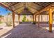 Large covered patio perfect for entertaining, featuring pavers and lighting at 9728 E Pantera Ave, Mesa, AZ 85212