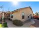 Exterior view of the home, highlighting its well-maintained facade and landscaped surroundings at 9728 E Pantera Ave, Mesa, AZ 85212