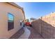 Exterior view of the home, highlighting its architectural design and landscaping at 9728 E Pantera Ave, Mesa, AZ 85212