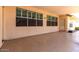 Covered patio area with durable flooring, offering a comfortable outdoor space at 9728 E Pantera Ave, Mesa, AZ 85212