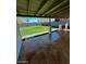 Covered back patio with decorative columns and view of a spacious backyard at 1017 S Lola Ln, Tempe, AZ 85281