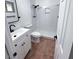 Bathroom featuring shower, toilet, sink with white vanity and tiled floor at 1017 S Lola Ln, Tempe, AZ 85281