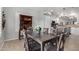 A cozy dining area shows a dining table and chairs set near a kitchen, perfect for Gathering gatherings at 10932 E Bella Via --, Mesa, AZ 85212