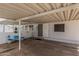 Inviting carport with space for seating enhances the home's curb appeal and outdoor living at 10951 N 91St Ave # 250, Peoria, AZ 85345