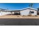 Charming single-story home with carport and desert landscaping, perfect for low-maintenance living at 10951 N 91St Ave # 250, Peoria, AZ 85345