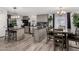 Inviting kitchen with modern appliances, open layout, and eat in dining table at 10951 N 91St Ave # 250, Peoria, AZ 85345