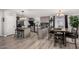 Modern eat-in kitchen with stainless appliances, great countertops and bar-stool seating at 10951 N 91St Ave # 250, Peoria, AZ 85345