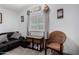 Inviting living room showing a comfortable sofa, chair, window and carpeted floors at 10951 N 91St Ave # 250, Peoria, AZ 85345