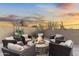 Cozy outdoor fire pit area surrounded by comfortable seating, perfect for gatherings at 11053 E Hedgehog Pl, Scottsdale, AZ 85262