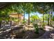 Beautifully landscaped path to a gazebo featuring an outdoor seating area, perfect for enjoying the scenic views at 1210 E Azure Sea Ln, Gilbert, AZ 85234