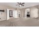Large main bedroom with carpet floors features ensuite bath, walk in closet, and neutral paint palette at 1210 E Azure Sea Ln, Gilbert, AZ 85234