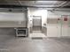 A clean, utilitarian space featuring an elevator and service area with neutral tones at 14000 N 94Th St # 3147, Scottsdale, AZ 85260