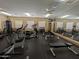 Bright community gym with machines, free weights and mirrored walls for a complete workout at 14000 N 94Th St # 3147, Scottsdale, AZ 85260