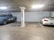 Well-lit parking garage with clearly marked spaces and support beams at 14000 N 94Th St # 3147, Scottsdale, AZ 85260