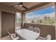 Relax on this beautiful patio with a ceiling fan and views of mountains and desert landscape at 14000 N 94Th St # 3147, Scottsdale, AZ 85260