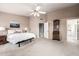 Spacious bedroom with connecting hall to bathroom and walk-in closet at 15027 N 61St Pl, Scottsdale, AZ 85254