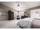 Spacious bedroom with carpet, ceiling fan and two windows for natural lighting at 15027 N 61St Pl, Scottsdale, AZ 85254