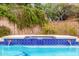 Tranquil view of the pool featuring a calming water feature at 15027 N 61St Pl, Scottsdale, AZ 85254