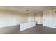 View of an open concept room with a neutral palette and abundant natural light at 15784 W Beryl Ave, Waddell, AZ 85355