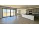 Bright living space with access to the backyard and an open kitchen with modern appliances at 15784 W Beryl Ave, Waddell, AZ 85355