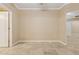 Neutral bedroom with ensuite bathroom and large mirror, tile floors and ceiling fan at 1701 E Colter St # 311, Phoenix, AZ 85016