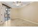 A naturally lit bedroom with access to a balcony, offering a bright and airy space at 1701 E Colter St # 311, Phoenix, AZ 85016
